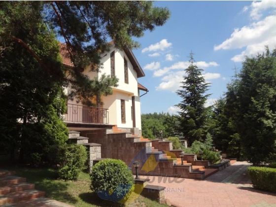 House near the pine forest and the Dnepr River